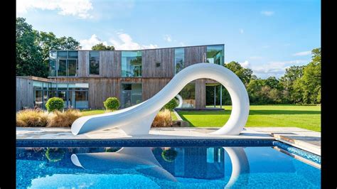 For the Thrill-Seekers and Pool Loungers: Decks, Slides, and Watery Fun