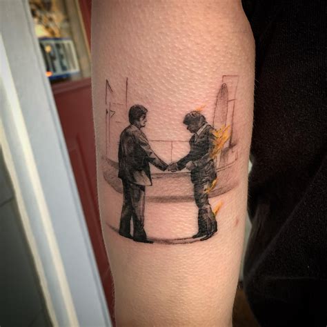 Shine On You Crazy Diamond: A Creative Guide to the Perfect Pink Floyd 'Wish You Were Here' Tattoo